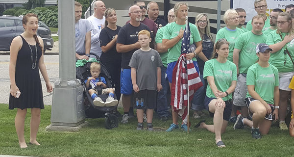 Torch runners beat storm back to the finish line
